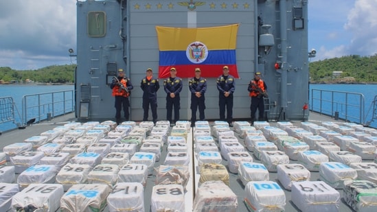 Members of the Colombian Navy stand guard along with three tons of cocaine that were seized in San Andres, Colombia on September 13.(Reuters)