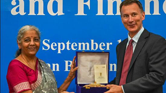 Union finance minister Nirmala Sitharaman with Jeremy Hunt, chancellor of the exchequer of UK, during the India-UK Economic and Financial Dialogue at Vigyan Bhawan in New Delhi on Sept 11 (PTI)