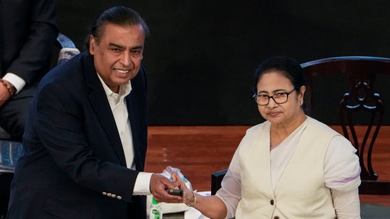 West Bengal Chief Minister Mamata Banerjee and Reliance Industries Chairperson Mukesh Ambani during the inaugural session of the 7th Bengal Global Business Summit, in Kolkata on Tuesday.(PTI)