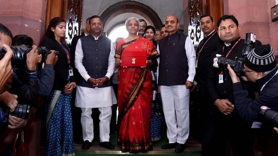 Nirmala Sitharaman, Union minister for finance and corporate affairs along with the ministers of state for finance, Pankaj Chaudhary and Dr. Bhagwat Kishanrao Karad and the senior officials arrived at Parliament ahead of presenting the Union Budget 2023-24 in New Delhi, India. (Hindustan Times)