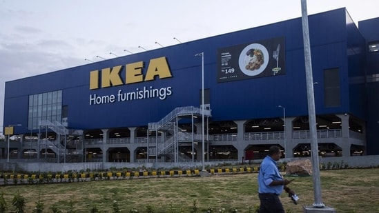 An employee walks long a road ahead of the opening of the Ikea store in Hitech City on the outskirts of Hyderabad in this file photo.(Bloomberg)