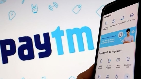 The interface of Indian payments app Paytm is seen in front of its logo displayed in this illustration (REUTERS)