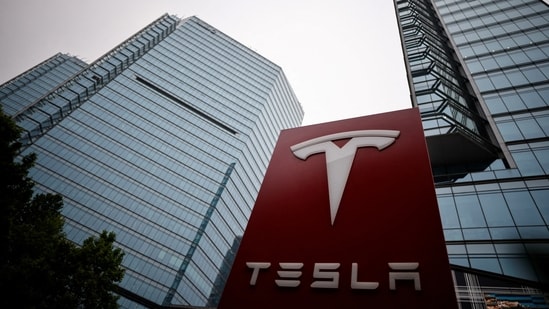 A Tesla logo is seen outside a showroom of the carmaker in Beijing, China.(REUTERS)