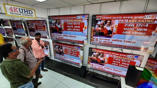 FILE: People watch the Union Budget being presented by Finance Minister Nirmala Sitharaman in the Parliament. (HT PHOTO)