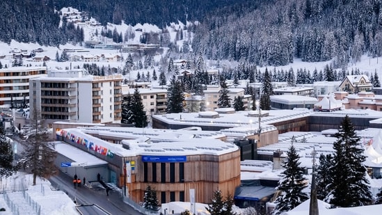 The Davos Congress Center, center, where the World Economic Forum is taking place is covered in snow in Davos, Switzerland.(AP)