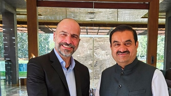 **EDS: IMAGE VIA @gautam_adani TWEETED ON FEB. 24, 2024** New Delhi: Adani Group Chairperson Gautam Adani with Uber CEO Dara Khosrowshahi during a meeting. (PTI Photo) 