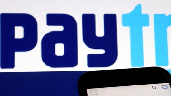 The interface of Indian payments app Paytm is seen in front of its logo displayed in this illustration picture taken July 7, 2021. REUTERS/Florence Lo/Illustration//File Photo