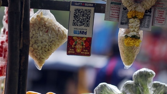Paytm stock market: A QR code for the Paytm digital payment system at a roadside vegetables stall in Mumbai. (Bloomberg)