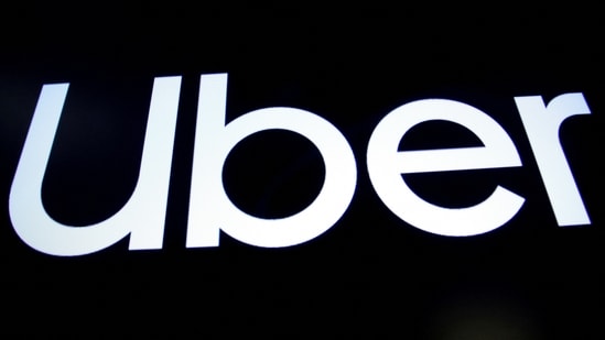 FILE PHOTO: A screen displays the company logo for Uber Technologies Inc. on the day of it's IPO at the New York Stock Exchange (NYSE) in New York, US.(REUTERS)